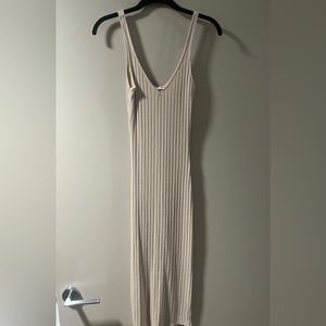 Zara dress from last summer collection . It has little slip in a back.